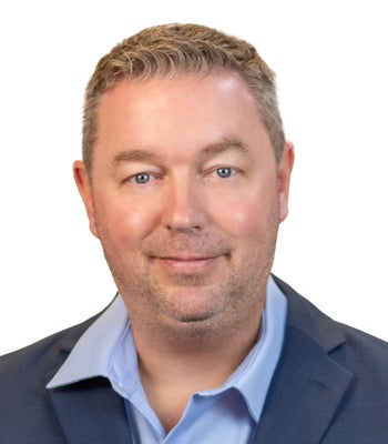 Portrait of Chris Plummer, REALTOR®.